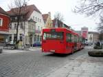 Busse/121765/ein-roter-langer-man-setra-bus Ein Roter langer MAN Setra Bus fhrt in Neumarkt auf der 'Obere Marktstrae' vorbei
